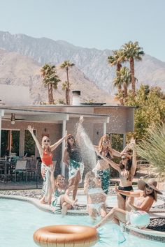 a group of people playing in a pool