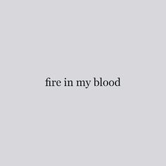 the words fire in my blood against a gray background