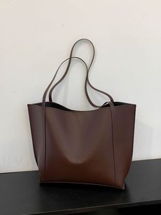 BagForLove - Streamlined Shoulder Tote: Ultimate Simplicity in Style Product Description Color Brown Strap Type Double Handle Style Elegant Bag Size Medium Pattern Type Plain Type Shoulder Tote Bag Material PU Leather Composition 100% Polyester Size Chart INCH CM Bag Length Bag Width Bag Height Handle Height 16.9 inch 4.7 inch 11 inch 11 inch Bag Length Bag Width Bag Height Handle Height 43 cm 12 cm 28 cm 28 cm Details Pictures Similar Products h2 { text-align: center; } /* æ¢è¡ */ li{ white-s Womens Work Bag, Uni Bag, Brown Tote Bag, Work Tote Bag, Elegant Bags, Brown Tote, Fancy Bags, Bags Aesthetic, Pretty Bags