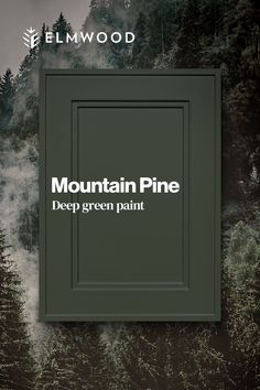 the mountain pine deep green paint is shown in front of a forest background with trees