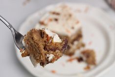 a piece of cake on a plate with a fork