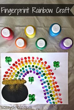 fingerprint rainbow craft for st patrick's day with shamrocks and pot of gold