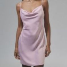 Urban Outfitters Mallory Cowl Neck Mini Slip Dress Satin Spaghetti Pink Size Xs. - This Is More Of A Baby Pastel Pink Than A Bright Bubblegum Pink - Effortless Mini Slip Dress From Uo Cut From A Satin-Finish Fabric. Fitted With Adjustable Spaghetti Straps At The Cowl Neck. Zipper At The Back. Mini-Length. Cowl Neck. Solid. Length Without Straps 30" Pit To Pit 16" Material: 97% Polyester, 3% Spandex Condition: Bnwt Feminine Fitted Camisole Mini Dress, Feminine Cami Dress For Party, Feminine Cami Party Dress, Elegant Summer Mini Dress By Urban Outfitters, Pink Cami Mini Dress, Spring Satin Cami Dresses, Casual Satin Slip Dress With Spaghetti Straps, Elegant Fitted Mini Dress By Urban Outfitters, Spring Cami Mini Dress In Satin