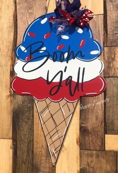 a wooden sign with an ice cream cone on it that says booh g'all