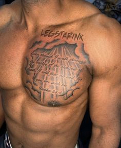 a man with a chest tattoo that says hestrapik on it's chest