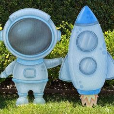 two cartoon characters are standing in the grass near some bushes and shrubs, one has a blue rocket ship on it's back end