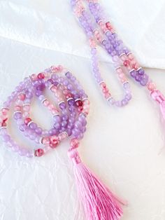 This japa mala necklace is made with 108 natural stone 6mm beads of amethyst and cherry quartz adorned with silver beads. This prayer garland  is the perfect support garland for counting mantras during your practices. Its a 108 6mm lovely beads mala, very light weight and delicate, a spiritual sacred jewelry for chakra healing. All our malas are very versatile, since you can use them on many occasions.hanging from the neck, with a turn or two on the wrist, with several turns. I make each mala by Sacred Jewelry, Cherry Quartz, Yoga Mindfulness, Chakra Yoga, Mala Necklace, Mala Beads, Chakra Healing, Lovers Gift, Silver Beads