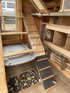 the inside of a tiny house with stairs