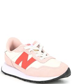 From New Balance&#x2C; the Girls' 237 Bungee Sneakers feature:Unbacked synthetic upperOversized N logoLarge scale ripple outsole with text brandingAsymmetric rubber tip wrapExposed foam tongueAngled 'New Balance' text at heel tabBungee closure system for easy on and offEVA midsoleImported. New Balance Pink Sneakers For Spring, N Logo, Cute Sneakers, Shoe Inspo, Pink Sneakers, School Fits, Shoe Closet, Pink Shoes, Eva Foam