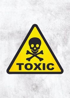 a yellow sign with a skull and crossbones on it that says toxic