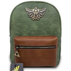 the legend of zelda backpack is next to a card