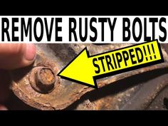 an old rusted metal object with a yellow arrow pointing to the bottom and remove rusty bolts