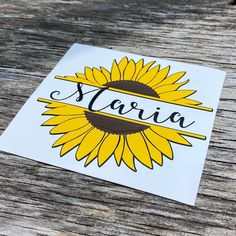 a sticker with the word navia on it and a sunflower in the middle