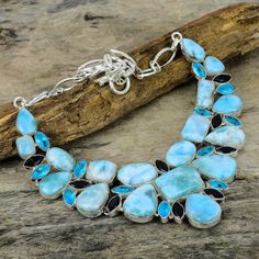 Larimar Gemstone Silver Plated Choker Necklace Jewelry For Women, Blue Topaz Necklace, Vintage Necklace, Wedding Gift for Bridal Please note : As this stone is natural, texture of every stone is different. so, the product you get in hands may slightly vary from the picture shown and not exact same as picture . And this is the beauty of each necklace being different than other. If any query, feel free and contact me. Crafted with the help of trained and experienced artisans team , our products are handmade with quality gemstones. I take care of perfect balance of combinations. We design each product taking care of style which will make you feel attractive . I also welcome to customize your choices. I try my best to serve my customers . **Thanks for Team Mohan Jewels** Blue Stone Necklace For Weddings, Blue Stone Necklaces For Anniversary, Blue Sterling Silver Multi-stone Necklace, Elegant Blue Multi-stone Necklaces, Necklace Blue Stone, Unique Blue Multi-stone Turquoise Necklace, Bohemian Blue Multi-stone Necklace, Blue Stones Jewelry, Artisan Blue Turquoise Multi-stone Necklace