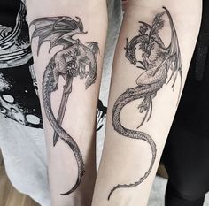 two dragon tattoos on both arms