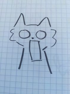 a drawing of a cat's face with its mouth open and tongue out on a sheet of paper