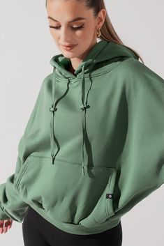 It's like wearing your boyfriend's hoodie... except better. Designed to feel like the ultimate warm hug, this oversized hoodie will be your new can’t-live-without. Comfortable Solid Sweats With Drawstring Hood, Comfy Drawstring Hoodie For Fall, Cozy Solid Sweats With Drawstring Hood, Comfy Sweatshirt With Drawstring Hood, Comfortable Cozy Fit Hooded Sweats, Comfortable Hoodie Sweats With Drawstring Hood, Athleisure Fleece Hoodie With Drawstring, Comfy Hoodie Sweatshirt With Drawstring Hood, Comfy Hoodie With Adjustable Hood