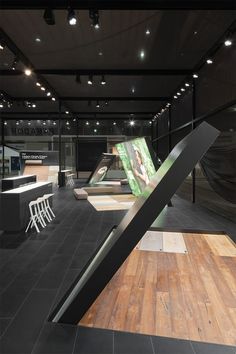 an indoor skate park with ramps and chairs