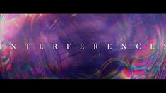 the title for an interactive video game with colorful paint and text that reads, interference