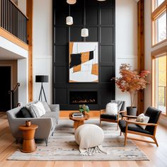 a living room filled with lots of furniture next to a fire place in a building