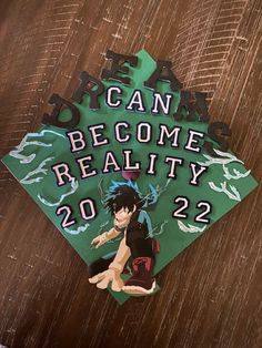 a green graduation cap with the words can become reality 20 22 and an anime character on it