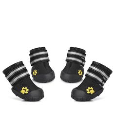 three pairs of black shoes with yellow paw prints on the soles and bottom part of each shoe