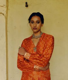 The rust printed shirt in dupion silk with embroidered cuffs paired with printed bell-bottom pants sounds like a chic and elegant ensemble. The combination of the printed shirt and pants adds visual interest, while the embroidered cuffs elevate the sophistication of the outfit. Embroidered Cuffs, Pant For Women, Dupion Silk, Bell Bottom Pants, Rust Orange, Bell Bottom, Full Sleeves, Pants Pattern, Modern Bride