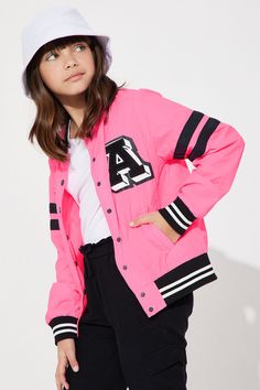 Available In Neon Pink And Black. Varsity Jacket Solid Pockets Button/Snap Front Disclaimer: Due To The Printing Process A Difference In Saturation May Occur. Each Garment Is Unique. 100% Nylon Imported | Mini A Lister Varsity Jacket in Neon Pink size 5/6 by Fashion Nova Trendy Varsity Jacket For Winter, School Varsity Outerwear With Pockets, Trendy Outerwear With Buttons For College, Spring Varsity Outerwear For School, Varsity Outerwear For School In Spring, Spring Varsity Jacket With Button Closure And Long Sleeves, Varsity Style Spring Outerwear For School, Trendy School Outerwear For Fall, Trendy Fall Outerwear For School