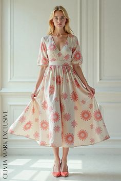 Olivia Mark - Elegant Floral Midi Dress with V-neckline and Puffed Sleeves Peach V-neck Dress For Brunch, Spring V-neck Apricot Dress, Feminine Apricot V-neck Dresses, Spring Apricot V-neck Dress, Feminine Peach V-neck Dress, Off White Floral Print V-neck Dress, Feminine Beige V-neck Dress For Spring, Bohemian Apricot V-neck Dress, Apricot Bohemian V-neck Dress