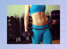 a woman is holding two dumbs in front of a wall full of exercise equipment