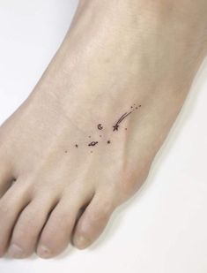 a person with a small tattoo on their foot