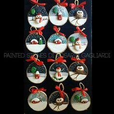 twelve christmas ornaments with snowmen and santa's sleighs on them