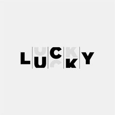 the word lucky in black and white letters