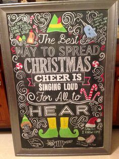 a chalk board with christmas sayings on it