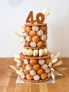 a cake made to look like the number forty four tiered with cookies and marshmallows