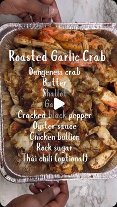 the roasted garlic crab is being served in a metal pan with instructions on how to cook it