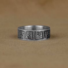 Unique Aztec and Mayan Hieroglyphics Band Ring, Ancient Unique Ring, Mythology Ring Jewelry, Ring For Best Friend, Gift For Husband, Gifts Made of 925 silver and handcrafted by hand, this ring is not only an accessory piece that complements your daily elegance, but also has details that will reflect your character and style. It is also a great gift to give to your loved ones on their special days. At SavisSilver, we always give importance to the satisfaction of our customers, we recommend you to Symbolic Etched Rings For Promise, Symbolic Engraved Stamped Ring For Promise, Symbolic Engraved Ring For Promise, Symbolic Etched Promise Ring, Symbolic Stamped Collectible Rings, Mayan Hieroglyphics, Husband Gifts, Gift For Husband, Unique Ring