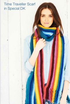 a woman wearing a multicolored scarf with the words time traveler scarf in special dk