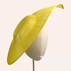 Get Royal Ascot ready with this extra large pointed tip Yellow sinamay fascinator base! Made from a triple layer of stiffened sinamay millinery fabric and is ideal for making an instant hat. This shape has a lovely pointed tip and a shallow crown. Get creative by positioning it at different angles on the head! Just add a headband for securing to the head (not included but available in our shop!) *This is not a fitted hat! You will need to sew in a headband or comb to attach it to your head* Meas Sinamay Fascinator With Curved Brim For Royal Ascot, Fitted Sinamay Costume Hat For Church, Summer Fascinator With Structured Crown In Sinamay, Summer Sinamay Fascinator With Structured Crown, Sinamay Fascinator With Curved Brim For Races, Brimmed Sinamay Fascinator For Church, Yellow Brimmed Fitted Fascinator, Fitted Mini Hat With Structured Crown In Sinamay, Fitted Sinamay Fascinator For Church