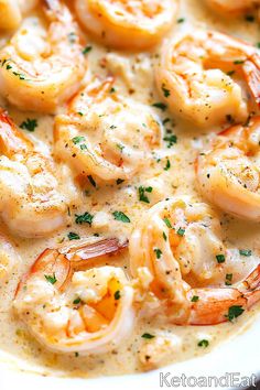 a close up of a plate of food with shrimp