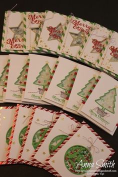 several christmas cards are laid out on top of each other