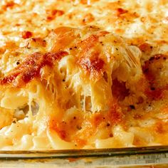 a casserole dish with cheese and sauce on it, ready to be eaten