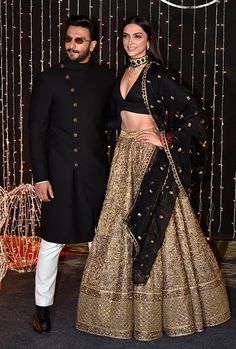 Gold Lehengas Bridal wear Bridal lehenga Bridal design Bridal look Bridal ideas Bridal golden lehenga reception wear Celebrity wedding Celebrity couple indian wedding wedding wear bridal dressing ideas bridal dressing wedding ideas Bridal outfit Indian weddings Indian wedding concepts Wedding concepts Black And Gold Lehenga, Diwali Fashion, Sangeet Outfit, Reception Outfit, Sabyasachi Lehenga, Black Lehenga, Indian Outfits Lehenga, Traditional Indian Outfits