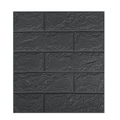 a black brick wall that is made out of dark colored slate tiles, with no mortaring