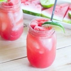 two mason jars filled with watermelon and limeade