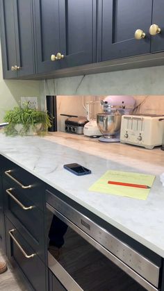 the kitchen counter is clean and ready to be used as a work station for cooking