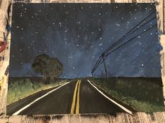 a painting of an empty road with power lines in the distance and a tree on the far side