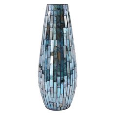 a tall vase with blue and brown mosaic tiles on the outside, in front of a white background