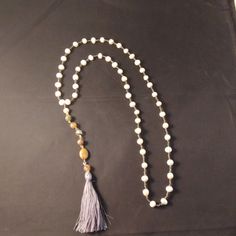 Excellent Estate Sale Find! Nwot Pearl Portion Of Necklace Is 14 In In Diameter, Total Length Of Necklace Is 20in Including Blue String Tassel. Glass Bead To End Of Tassel Is 6 In In Length. Beautiful Addition To Any Outfit! Pet And Smoke-Free. White Bohemian Beaded Necklaces With 8mm Beads, White Long Necklace With Round Beads For Gift, Elegant White Beaded Necklace For Meditation, Adjustable White Tassel Necklace Gift, Bohemian White Pearl Necklace With Round Beads, White Beaded Long Necklace For Gift, White Long Tassel Necklace As Gift, White 8mm Beaded Bohemian Necklaces, Bohemian Pearl White Necklaces With Round Beads