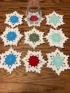 "Set of 4 crocheted snowflake coasters. Snowflake coasters will add a seasonal touch to your table, kitchen, or nightstand! Pretty and practical, they make great housewarming, christmas, or anytime gift! Measurements: About 5.5\" at longest diameter. Materials: 100% cotton yarn Care: Machine wash (cold) in a delicates bag or wash by hand. Lay flat to dry. Press under a book to flatten more.  Thanks for looking! Message me for questions or requests for other colors. Check out my shop for more cro Crocheted Coasters, Cat Coasters, You're Amazing, Decorative Tiles, Table Kitchen, Blue Snowflakes, Crochet Coasters, Note Writing, Decorative Tile